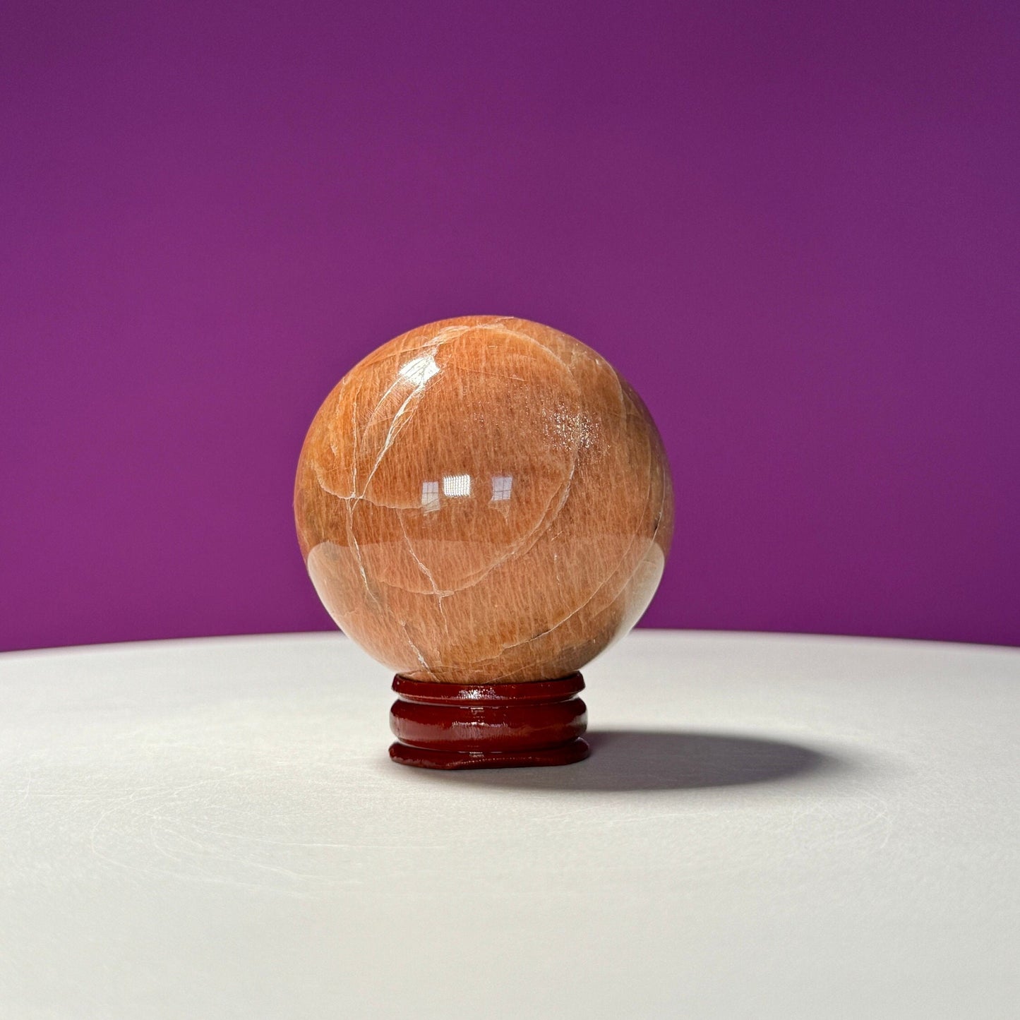 Peach Moonstone Sphere (Includes Wood Stand)