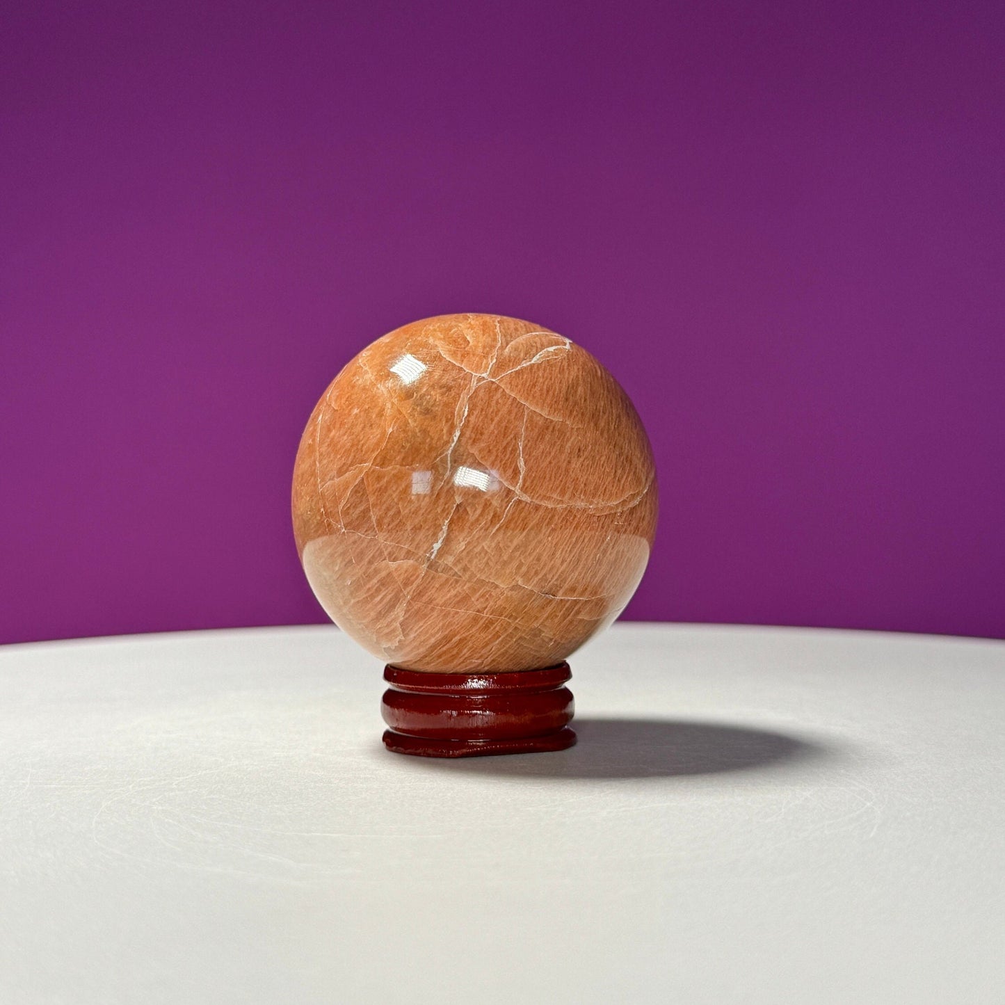 Peach Moonstone Sphere (Includes Wood Stand)